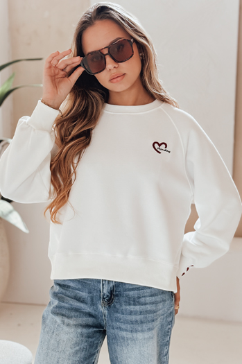 Ženska bluza z izvezenimi srčki MONLOVE bela Dstreet BY1507